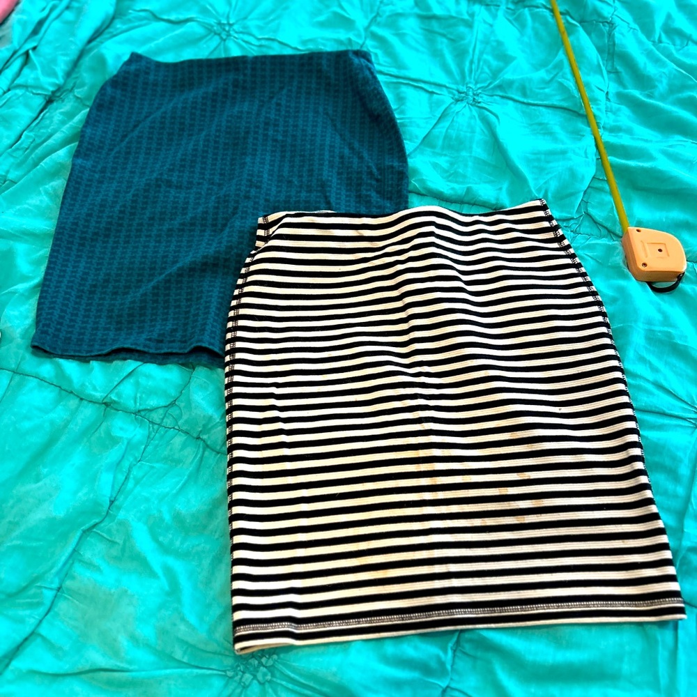 Two wiggle skirts. Black and white striped and teal houndstooth.